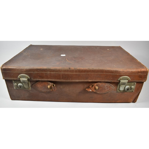 133 - A Vintage Leather Suitcase, 61cm wide, Handle Requires attention