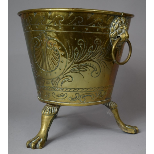 137 - A Brass Cylindrical Planter on Three Claw Feet with Lion Mask Ring Carrying Handles, 26cm diameter