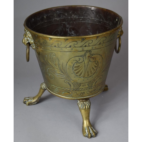 137 - A Brass Cylindrical Planter on Three Claw Feet with Lion Mask Ring Carrying Handles, 26cm diameter