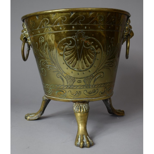 137 - A Brass Cylindrical Planter on Three Claw Feet with Lion Mask Ring Carrying Handles, 26cm diameter