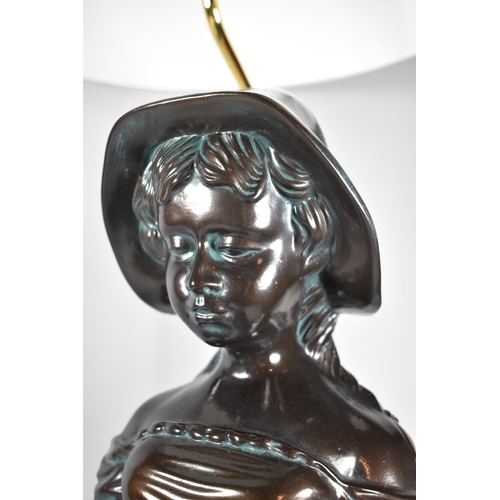 141 - A Glazed Ceramic Figural Table Lamp in the Form of Girl with Basket, Complete with Shade, 104cm high... 