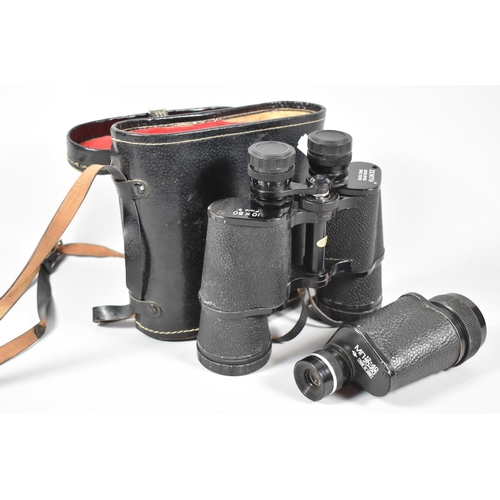 142 - A Pair of Cased 10x50 Field Binoculars and a Russian Monocular