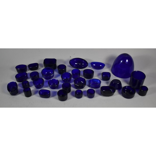 154 - A Collection of Various Cobalt Blue Glass Salt and Mustard Liners