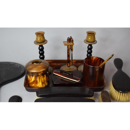 204 - A Collection of Ebony and Faux Tortoiseshell Dressing Table Sets