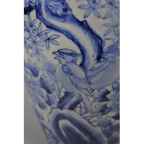 367 - A 19th Century Chinese Blue and White Vase Decorated with Flowers and Trees, 46cm high