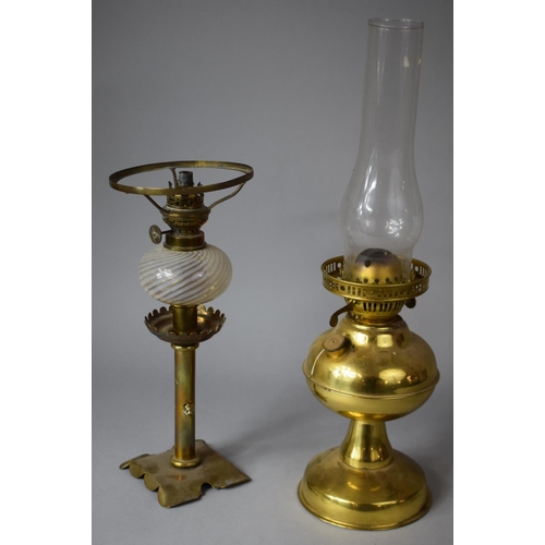 369 - A Collection Brass Items to Include Three Brass Vases, Oil Lamps and a Kettle