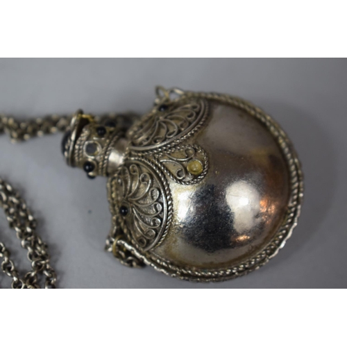 370 - An Eastern White Metal Perfume Flask on Chain with Glass Cabochon Mounts