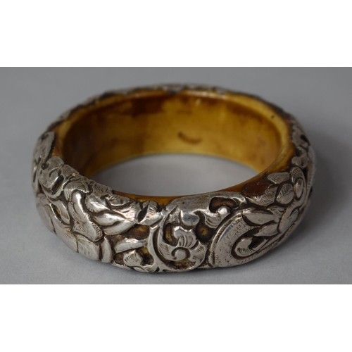 376 - A Vintage Chinese Bangle Having White Metal Overlay Depicting Dragon, 8.5cm diameter