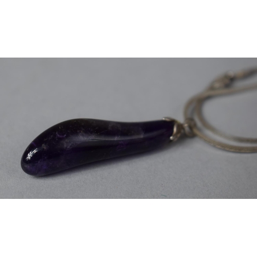 405 - An Amethyst Pendant on Silver Chain Stamped 925