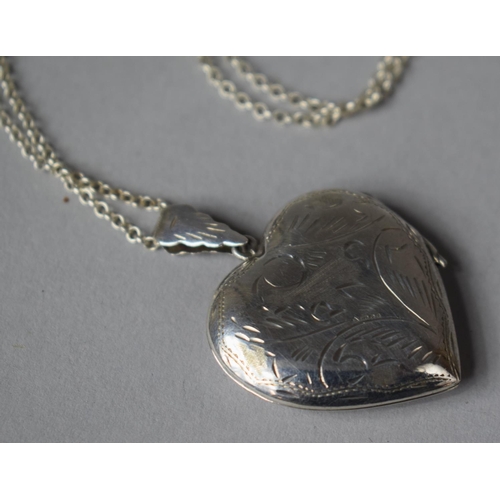 407 - A Large Heart Shaped Locket on Silver 925 Chain