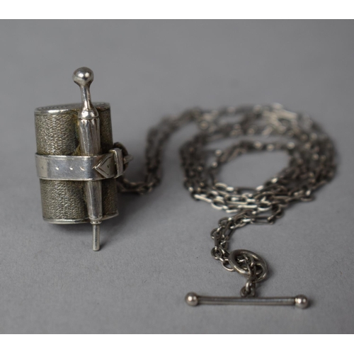 422 - A White Metal Charm Depicting Umbrella and Rolled Picnic Blanket on an Early T Bar Silver Chain