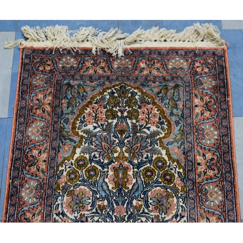 509 - A Small Rectangular Silk Rug, 106x59cm