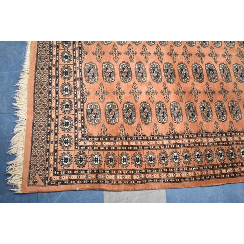 517 - A Patterned Woollen Rug, 185x124cm