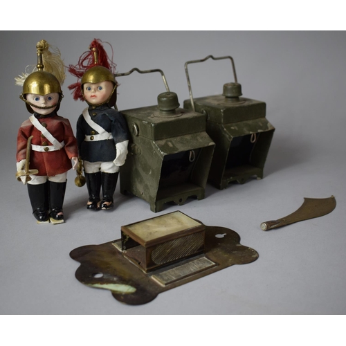 64 - A Small Collection of Militaria to Include Two Military Dolls, Two WWII Traffic Signalling Lanterns ... 