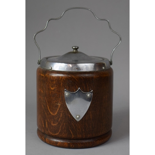 89 - An Edwardian Oak Biscuit Barrel with Shield Mount