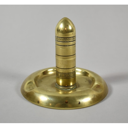 110 - A Trench Art Brass Combination Lighter/Ashtray on Circular Base, 10cm Diameter