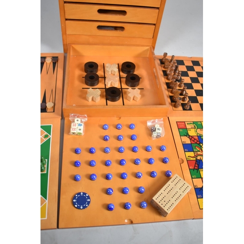 87 - A Modern Wooden Games Compendium Cabinet with Pull Out Slides and Four Drawers, Complete with Pieces... 