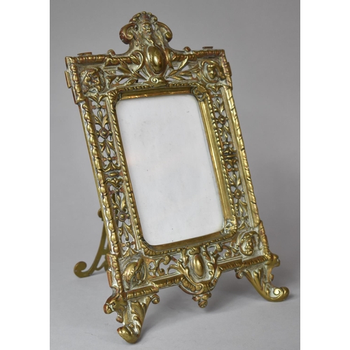 9 - A Pierced Brass Easel Backed Photo Frame, 29cm High