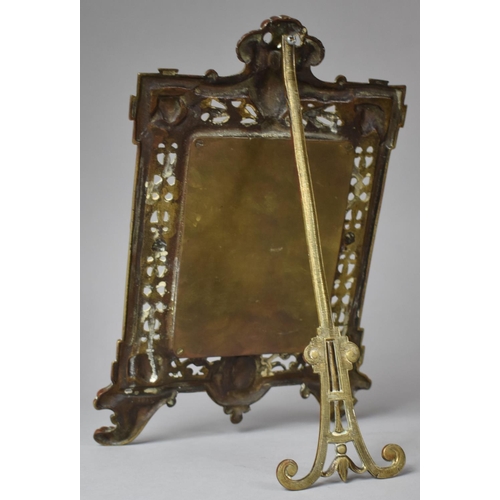 9 - A Pierced Brass Easel Backed Photo Frame, 29cm High