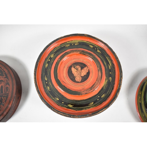 91 - An Oriental Circular Lacquered Food Box with Inner Bowl, Spoon and Four Small Bowls, 18cm Diameter