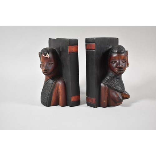 93 - A Pair of Carved African Souvenir Bookends Depicting Masai Tribes People, 16cm high