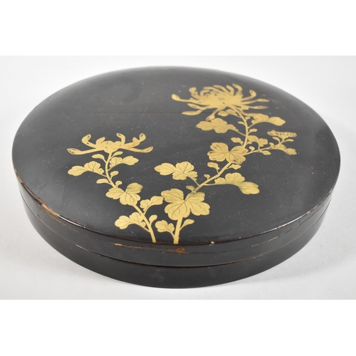 96 - A Circular Lacquered Chinese Hors d'oeuvres Dish and Cover with Seven Removable Trays, Gilt Decorati... 