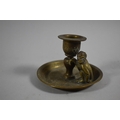 A Small Brass Candlestick with Monkey Mount by Kinco, England