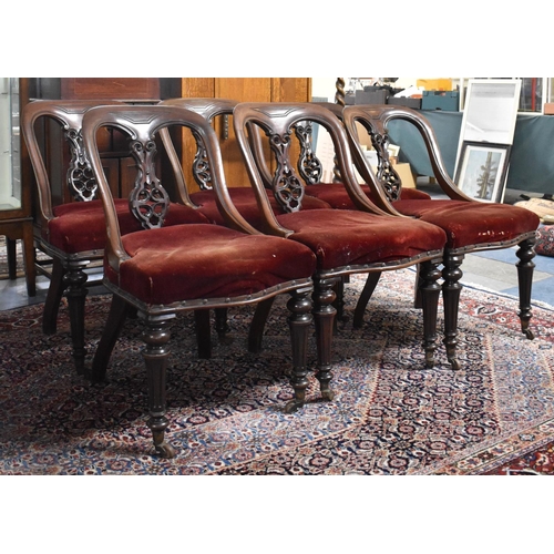 541 - A Set of Six Late Victorian Mahogany Framed Wheel Back Dining Chairs with Red Velvet Upholstery