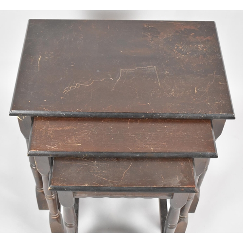 543 - A Mid 20th Century Nest of Three Oak Tables, The Largest 51cm