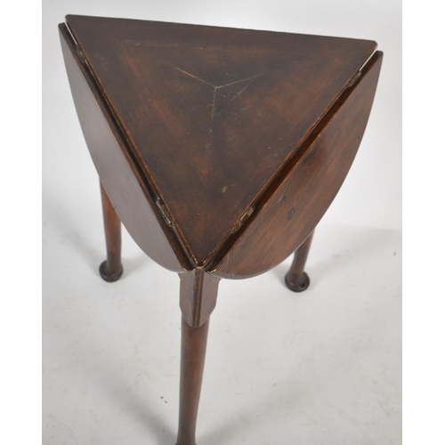 564 - A 19th Century Mahogany Twist Top Drop Leaf Triangular Table on Cricket Supports