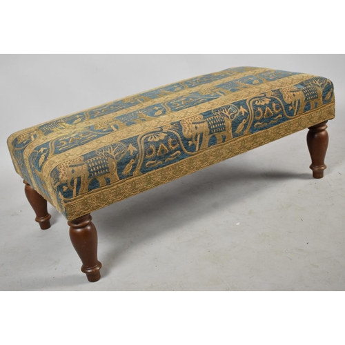 567 - A Modern Rectangular Footstool with Tapestry Upholstery Depicting Elephants and Birds, 93cm wide