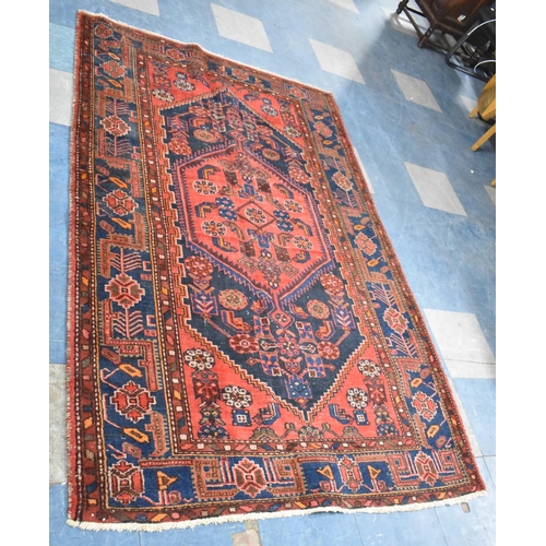 568 - An Antique Handmade Persian Toyserkan Rug 200x108cm