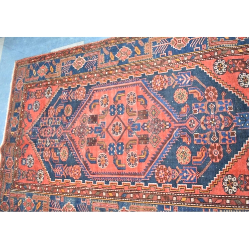 568 - An Antique Handmade Persian Toyserkan Rug 200x108cm