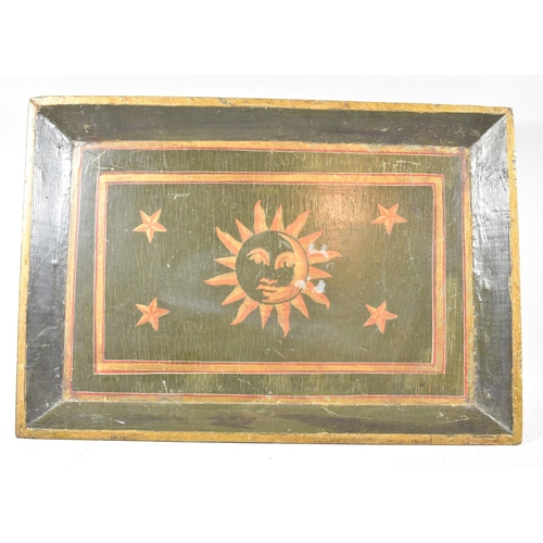 71 - A Decorated Wooden Tray Painted with Sun and Stars, 51cm wide