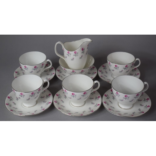 320 - A Royal Albert Floral Pattern Part Teaset to comprise Six Saucers, Five Teacups and a Jug