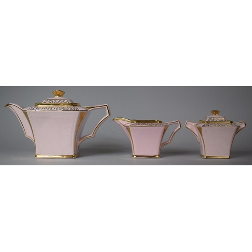 322 - A Pink and Gilt Sadlers Three Piece Teaset comprising Teapot, Milk and Lidded Sugar