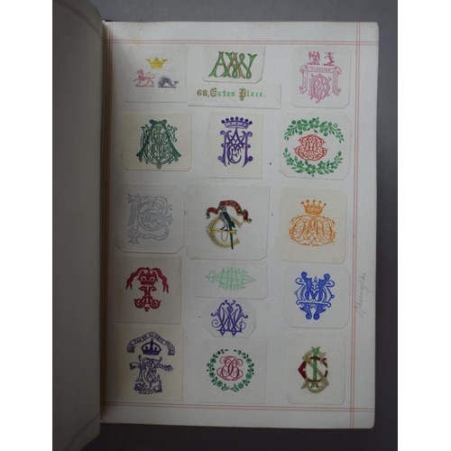 350 - A Leather Bound and Tooled Leather Album Containing Affixed and Loose Printed Crests and Monograms