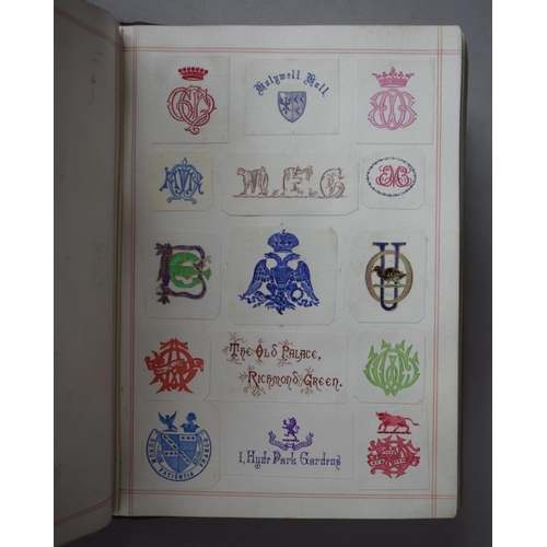 350 - A Leather Bound and Tooled Leather Album Containing Affixed and Loose Printed Crests and Monograms