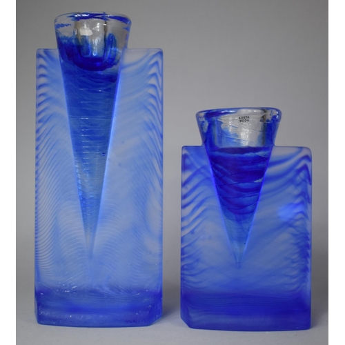 402 - A Pair of Graduated Blue Glass Candle Sticks, 19cm and 28cm high