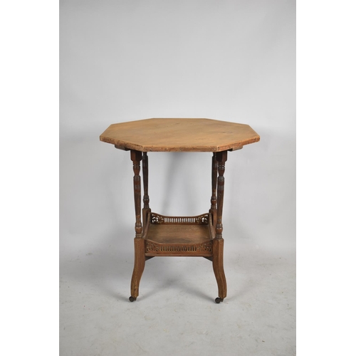 598 - An Edwardian Octagonal Occasional Table with Galleried Stretcher Shelf, 65cm Diameter