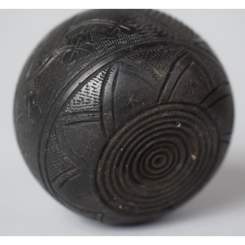 6 - A Carved Irish Bog Oak Globular Match Holder Decorated with Harp, Shamrock and Shield, 4.25cm high