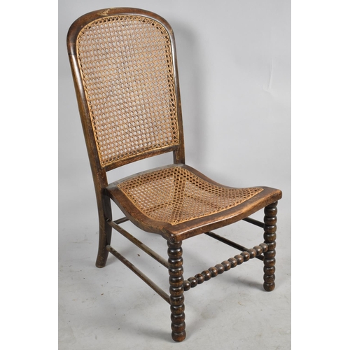 605 - A Late 19th/Early 20th Century Bobbin Framed Cane Upholstered Ladies Nursing Chair