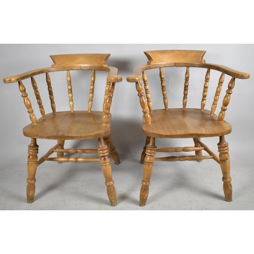 607 - A Pair of Mid 20th Century Smokers Bow Arm Chairs with Spindle Backs