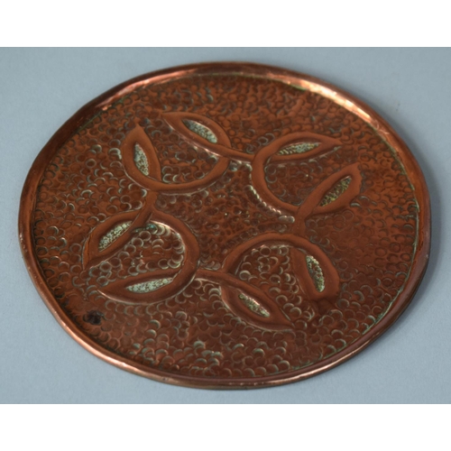 104 - A Circular Copper Arts and Crafts Disk, 13.5cm Diameter