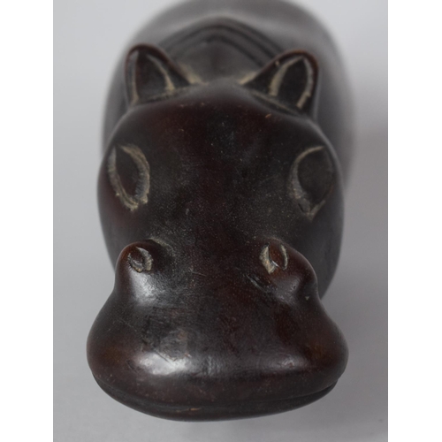 117 - A Carved Souvenir Study of a Hippo Calf, 19cm Long