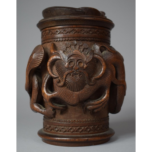 249 - A Carved Indonesian Wooden Tobacco/Caddy Box Decorated in High Relief with Dragons, 17cm high