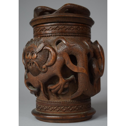 249 - A Carved Indonesian Wooden Tobacco/Caddy Box Decorated in High Relief with Dragons, 17cm high