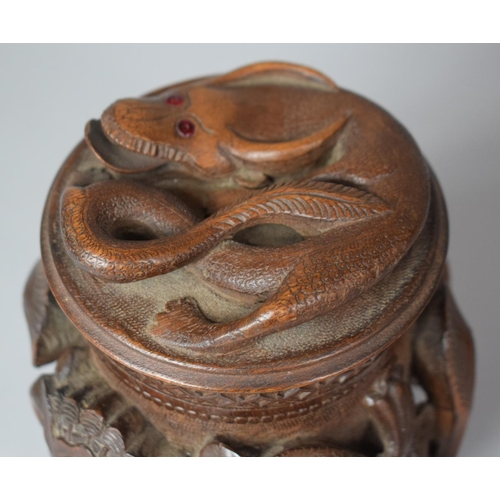 249 - A Carved Indonesian Wooden Tobacco/Caddy Box Decorated in High Relief with Dragons, 17cm high