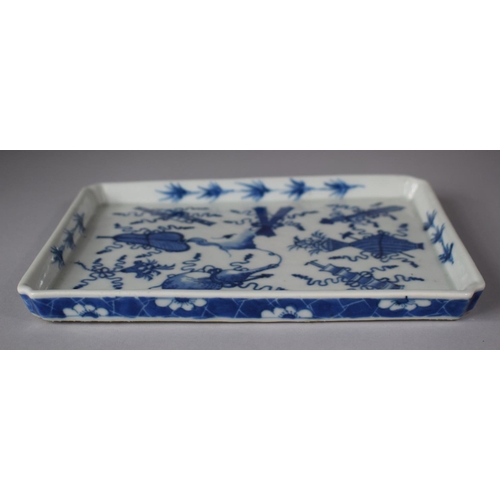 258 - A Chinese Blue and White Rectangular Tray Decorated with Interior Objects and Swags and Having Prunu... 