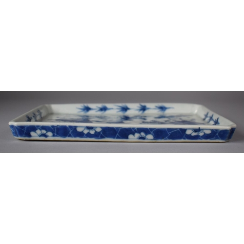 258 - A Chinese Blue and White Rectangular Tray Decorated with Interior Objects and Swags and Having Prunu... 